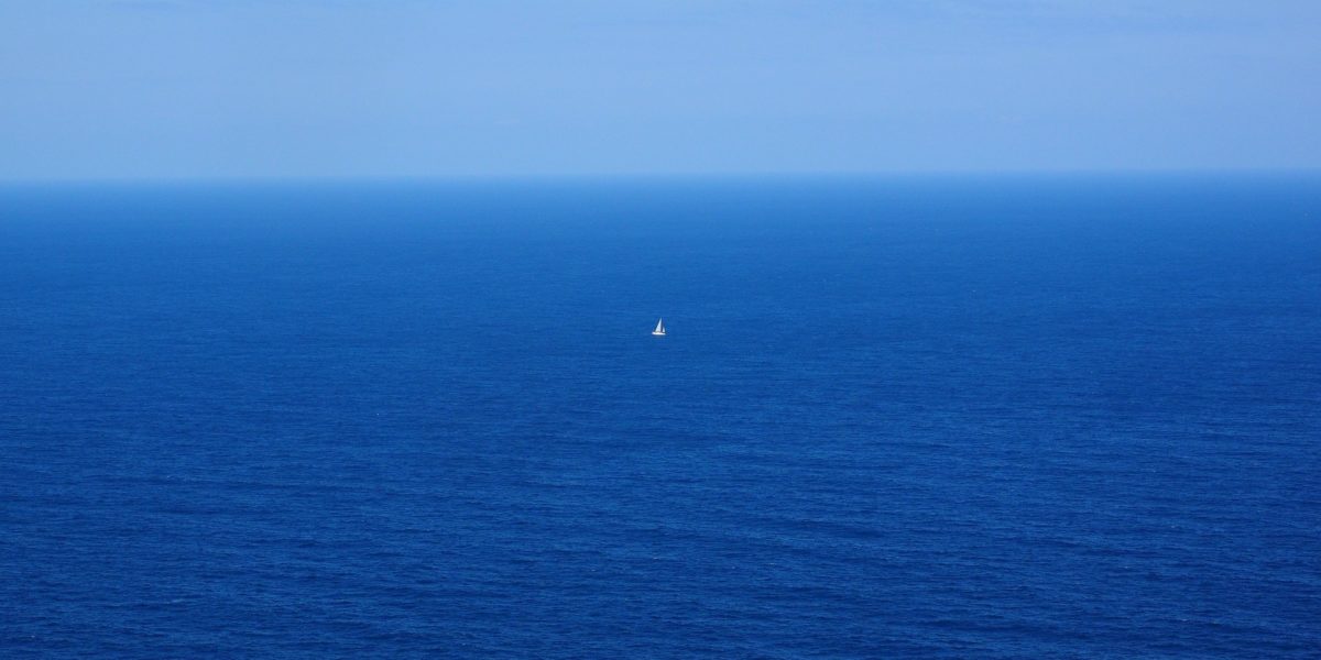 A boat in the middle of the sea